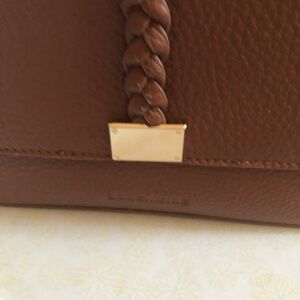 Brown Shoulder Bag with Braided Detail and Metallic Accent